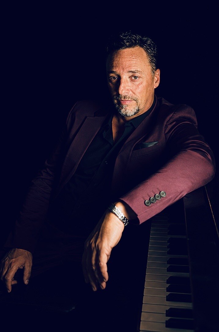 Jack Rivers at the piano